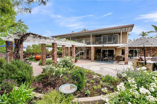 1475 Trenton Dr, Riverside, CA 92506 - back of house featuring a patio and stairs