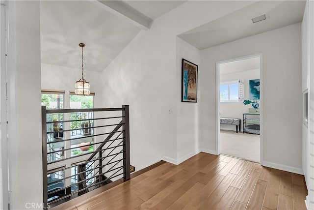 1475 Trenton Dr, Riverside, CA 92506 - corridor with an upstairs landing, wood finished floors, and baseboards