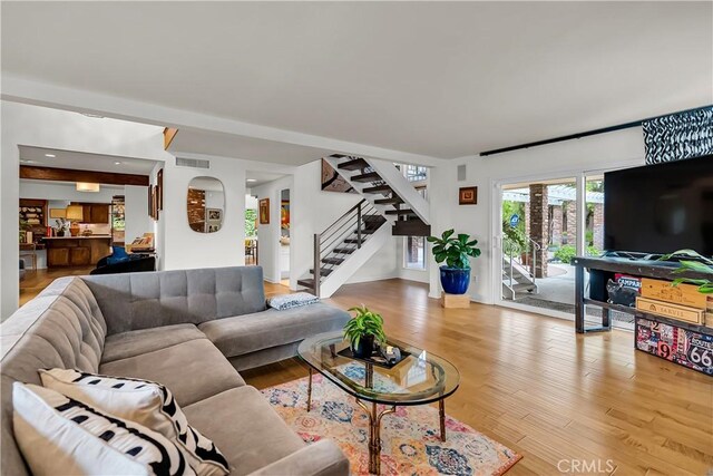 1475 Trenton Dr, Riverside, CA 92506 - living area with stairway and light wood-style floors