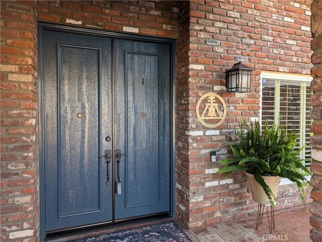 1475 Trenton Dr, Riverside, CA 92506 - doorway to property with brick siding