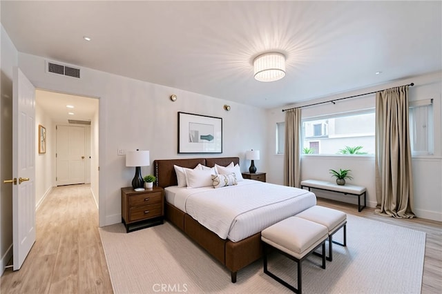 8963 Burton Way Unit 103, Los Angeles, CA 90048 - bedroom featuring light wood-style flooring and baseboards
