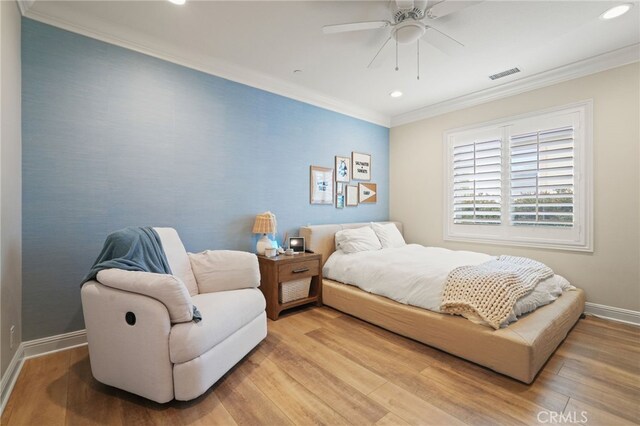 bedroom featuring ornamental molding, recessed lighting, light wood finished floors, baseboards, and ceiling fan