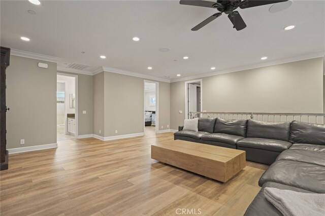 living room featuring light wood-style flooring, recessed lighting, a ceiling fan, ornamental molding, and baseboards
