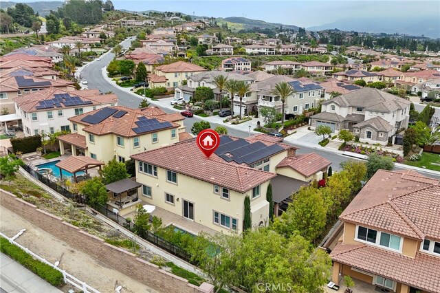 aerial view of residential area with a mountain backdrop