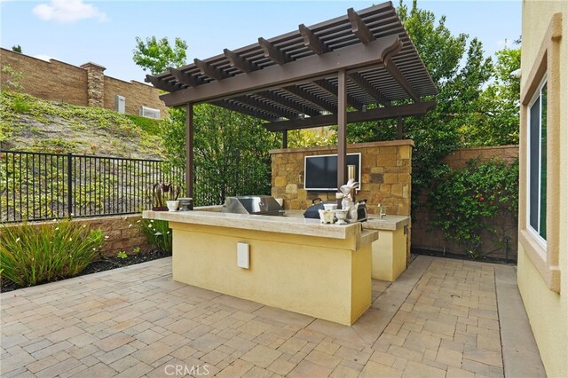 view of patio / terrace with area for grilling, a fenced backyard, a grill, and a pergola