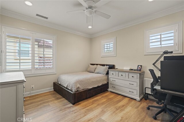bedroom with recessed lighting, light wood finished floors, baseboards, ornamental molding, and a ceiling fan