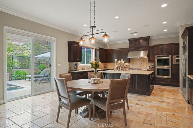 dining space featuring recessed lighting, stone tile floors, and ornamental molding