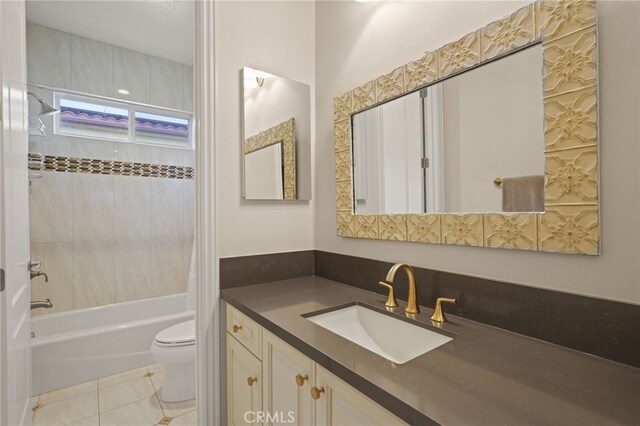 bathroom with toilet, vanity, shower / washtub combination, and tile patterned flooring