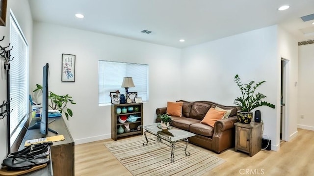 13611 Glenhaven Dr, Garden Grove, CA 92843 - living area featuring light wood-style flooring, baseboards, and recessed lighting