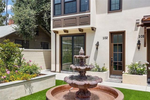 81 N Grand Oaks Ave Unit 102, Pasadena, CA 91107 - property entrance featuring stucco siding and fence