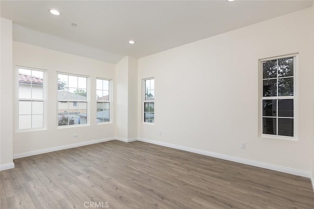 81 N Grand Oaks Ave Unit 102, Pasadena, CA 91107 - spare room featuring wood finished floors, baseboards, and recessed lighting