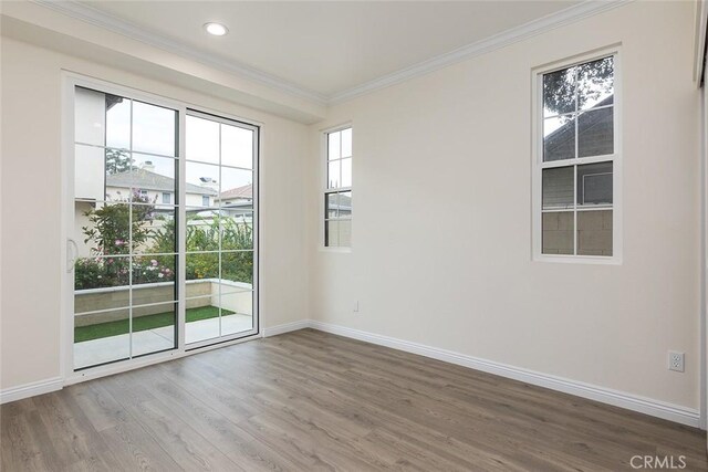 81 N Grand Oaks Ave Unit 102, Pasadena, CA 91107 - empty room with crown molding, baseboards, wood finished floors, and recessed lighting