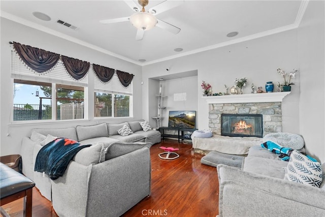 11874 Grayhawk Cir, Yucaipa, CA 92399 - living area with wood finished floors, crown molding, ceiling fan, and a stone fireplace