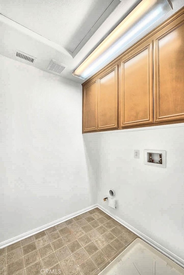 37089 Meadow Brook Way, Beaumont, CA 92223 - clothes washing area featuring cabinet space, baseboards, washer hookup, and dark floors