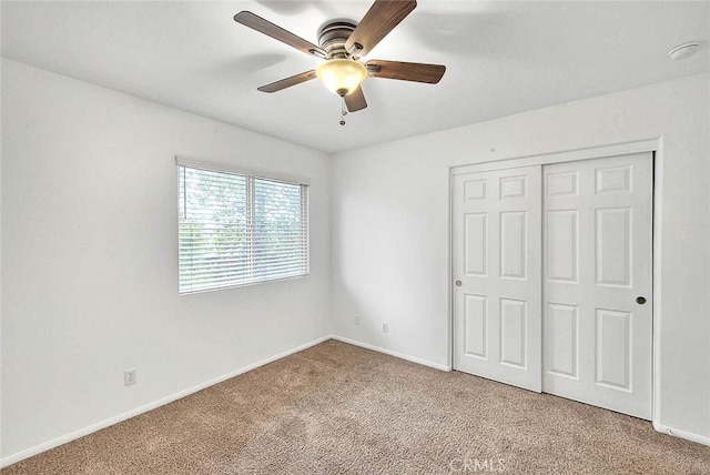 37089 Meadow Brook Way, Beaumont, CA 92223 - unfurnished bedroom with carpet flooring, a closet, baseboards, and ceiling fan