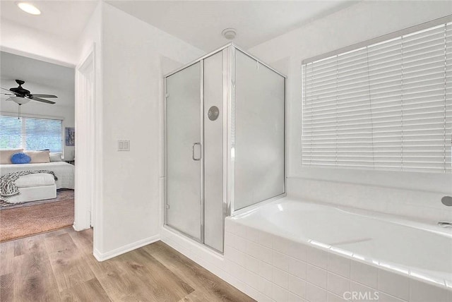 37089 Meadow Brook Way, Beaumont, CA 92223 - ensuite bathroom with wood finished floors, a shower stall, a bath, ceiling fan, and baseboards
