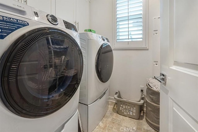 laundry room featuring washer and dryer
