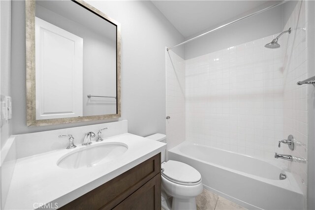 full bathroom with toilet, vanity, tub / shower combination, and tile patterned flooring