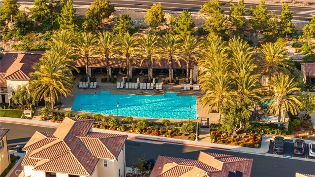 community pool featuring a patio area