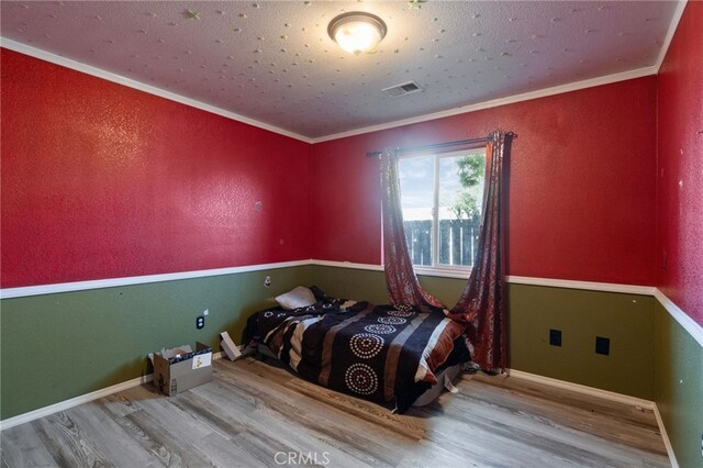 1451 Segovia Ct, Madera, CA 93638 - bedroom with wood finished floors, ornamental molding, and baseboards