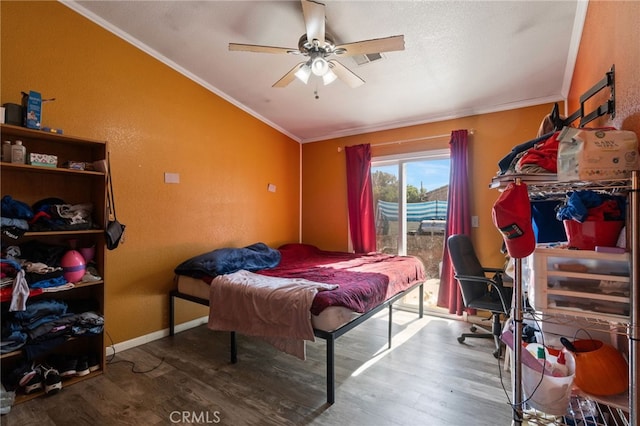 1451 Segovia Ct, Madera, CA 93638 - bedroom featuring access to outside, wood finished floors, lofted ceiling, ornamental molding, and baseboards