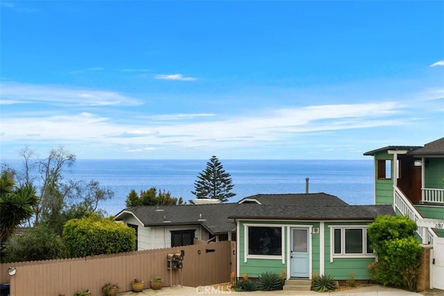 2785 Solana Way, Laguna Beach, CA 92651 - view of front of property featuring roof with shingles, a water view, and a gate