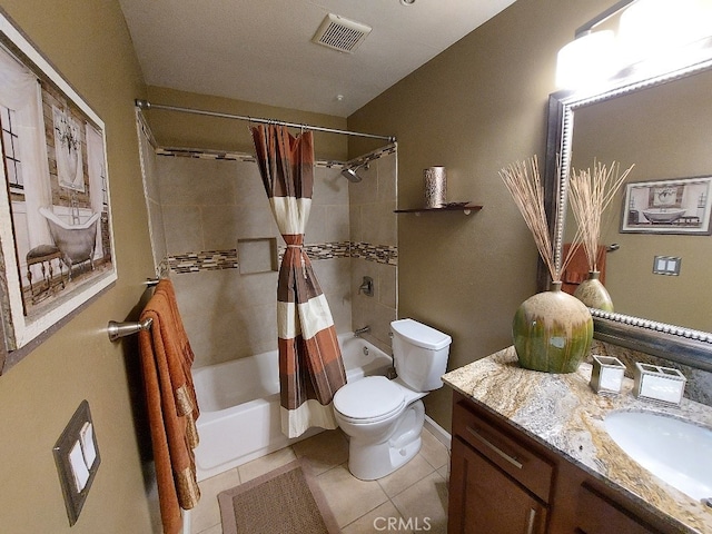 full bathroom featuring vanity, tile patterned flooring, shower / bath combo, toilet, and baseboards