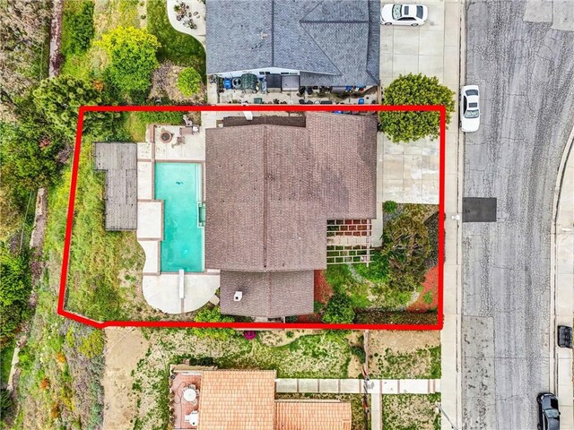 view of property location with property parcel outlined and a pool