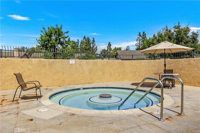 22951 Caminito Viento, Laguna Hills, CA 92653 - view of pool featuring a hot tub, fence, and a patio