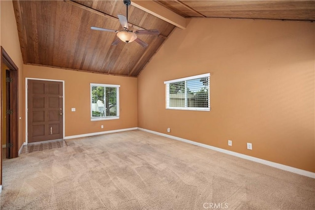 22951 Caminito Viento, Laguna Hills, CA 92653 - spare room featuring wooden ceiling, beamed ceiling, light colored carpet, a ceiling fan, and baseboards