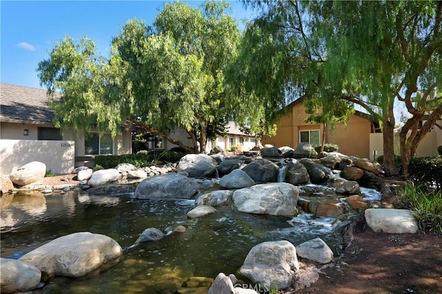 22951 Caminito Viento, Laguna Hills, CA 92653 - view of yard with a small pond