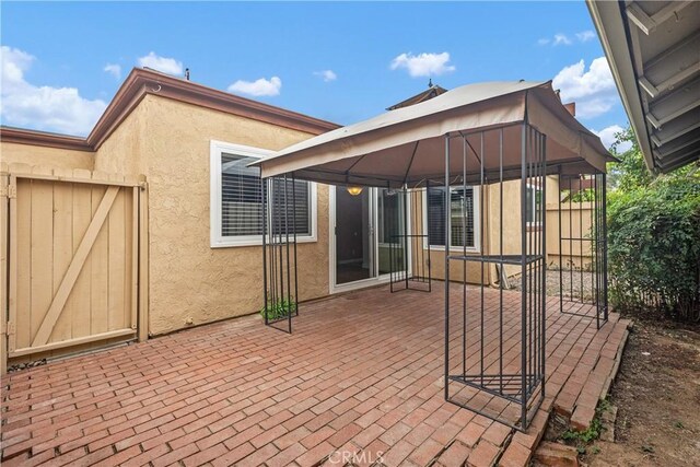 22951 Caminito Viento, Laguna Hills, CA 92653 - view of patio / terrace featuring a gazebo and a gate