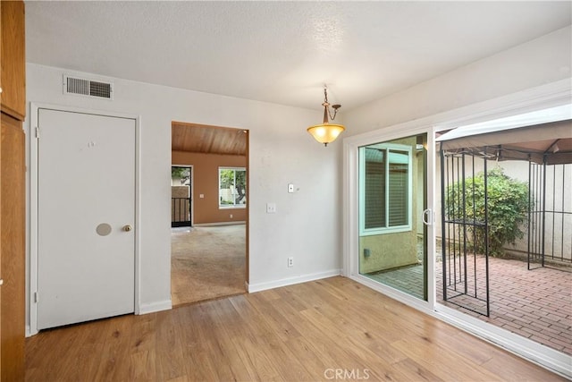 22951 Caminito Viento, Laguna Hills, CA 92653 - unfurnished room featuring light wood-style floors and baseboards