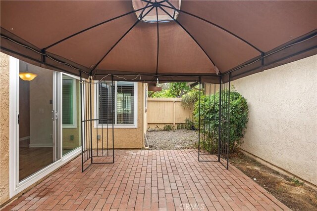 22951 Caminito Viento, Laguna Hills, CA 92653 - view of patio / terrace with a gazebo and fence