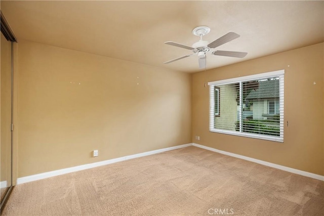 22951 Caminito Viento, Laguna Hills, CA 92653 - unfurnished room with baseboards, light carpet, and a ceiling fan