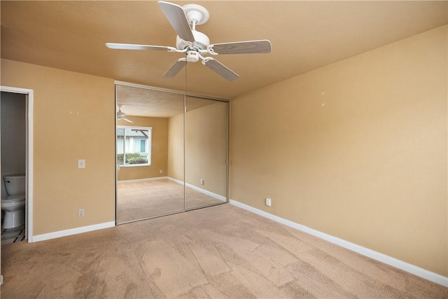 22951 Caminito Viento, Laguna Hills, CA 92653 - unfurnished bedroom featuring carpet flooring, a closet, baseboards, and ceiling fan