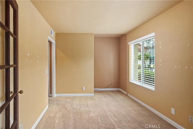 22951 Caminito Viento, Laguna Hills, CA 92653 - unfurnished room with light carpet and baseboards