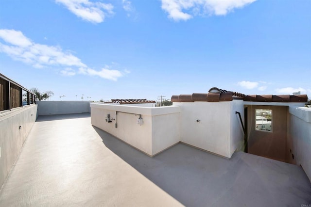 view of patio with a balcony