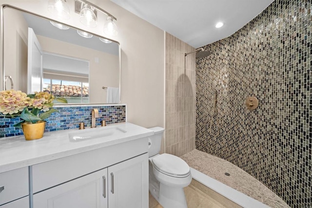 812 N Cleveland St Unit 3, Oceanside, CA 92054 - full bath with toilet, a tile shower, vanity, backsplash, and tile patterned floors