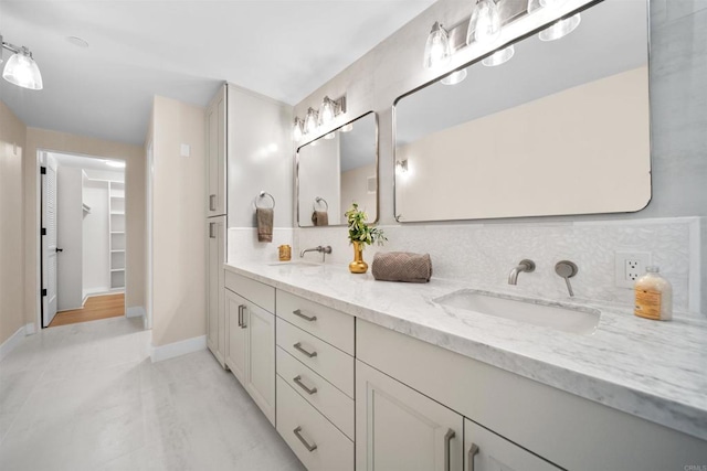 812 N Cleveland St Unit 3, Oceanside, CA 92054 - full bathroom featuring double vanity, backsplash, and baseboards