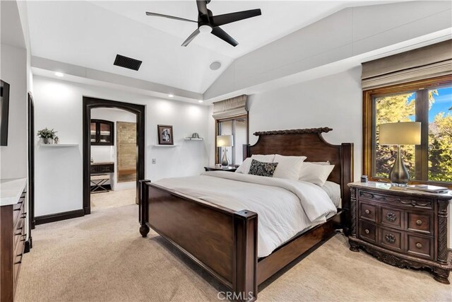 bedroom featuring light carpet, lofted ceiling, a ceiling fan, and recessed lighting