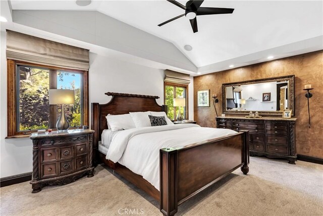 bedroom featuring vaulted ceiling, light colored carpet, baseboards, recessed lighting, and ceiling fan