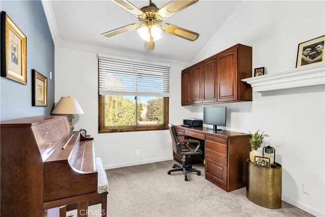 office area featuring ornamental molding, ceiling fan, light carpet, lofted ceiling, and baseboards