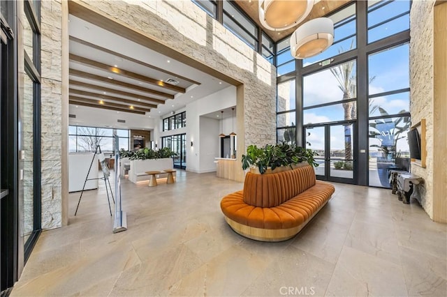 community lobby featuring a high ceiling