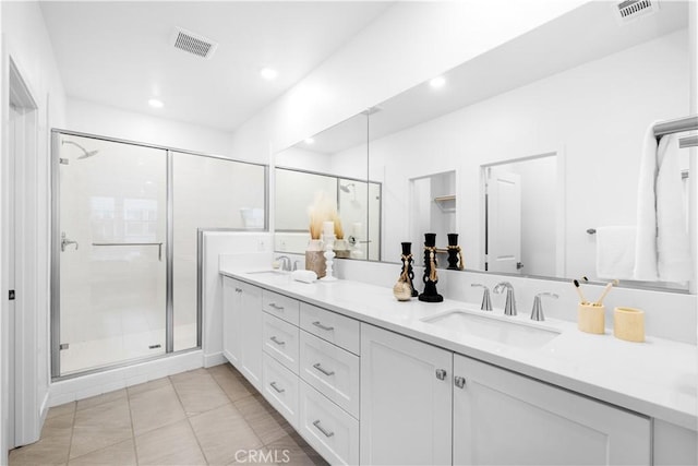 1228 Poppy Ct, Montebello, CA 90640 - bathroom with a shower stall, double vanity, recessed lighting, and tile patterned flooring