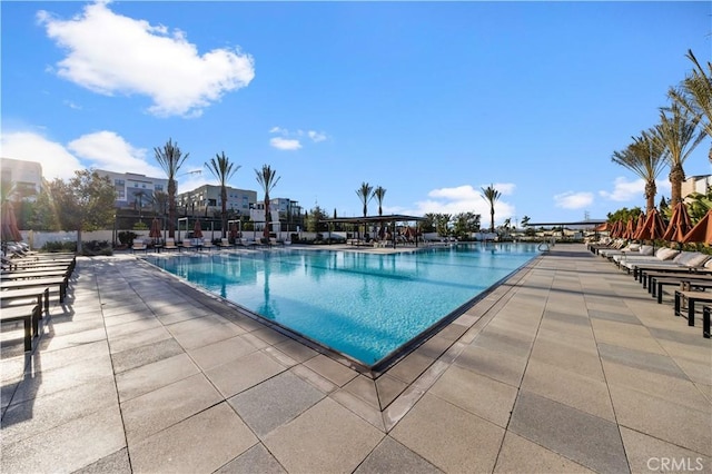 community pool featuring a patio area