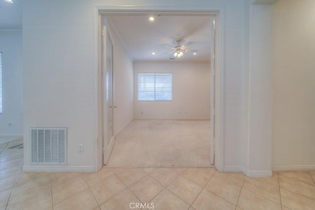 42133 Wagon Wheel Ln, Murrieta, CA 92562 - carpeted spare room with crown molding, ceiling fan, baseboards, tile patterned floors, and recessed lighting