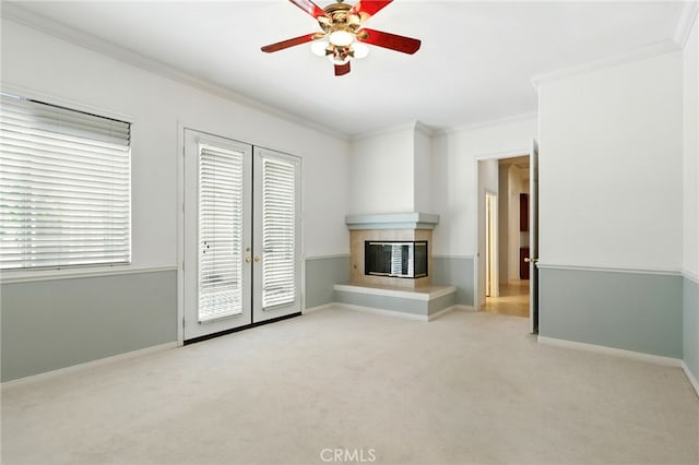 42133 Wagon Wheel Ln, Murrieta, CA 92562 - unfurnished living room with a fireplace, crown molding, a ceiling fan, carpet flooring, and french doors