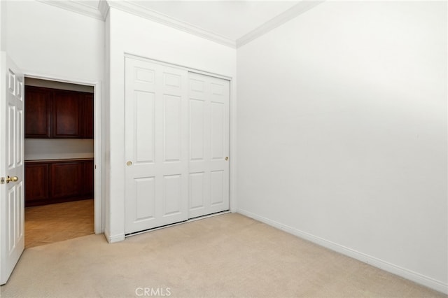 42133 Wagon Wheel Ln, Murrieta, CA 92562 - unfurnished bedroom with light colored carpet, crown molding, and a closet