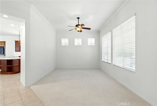 42133 Wagon Wheel Ln, Murrieta, CA 92562 - spare room with ceiling fan, crown molding, recessed lighting, and light tile patterned floors